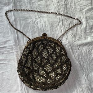Vintage handbag silk backing, brown embroidery with rhinestones, gold frame.